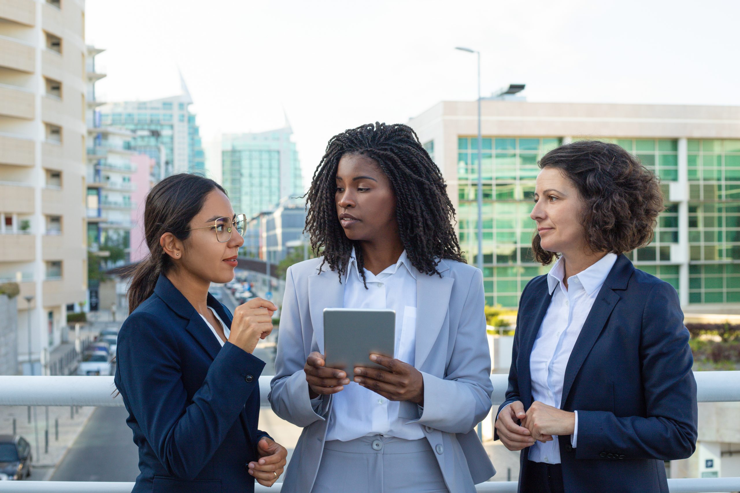Professional businesswomen with tablet